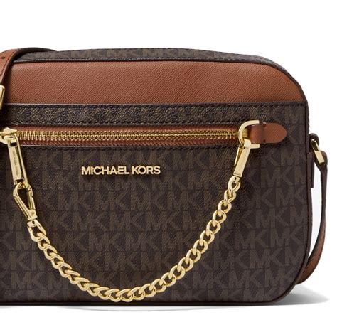 michael kors jet set logo sling pack|Jet Set Large Logo Crossbody Bag .